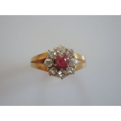 BAGUE 2 joncs ornée d’un grenat spessartite...
