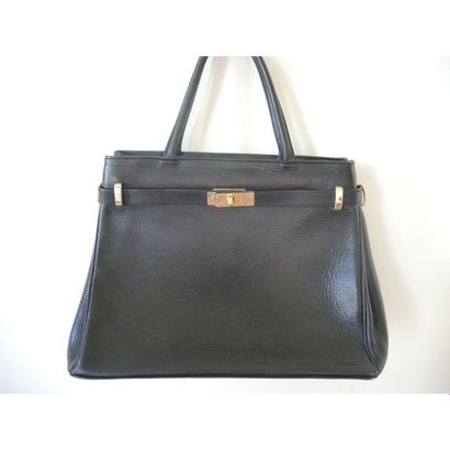 Sabatier.
Sac en cuir grainé noir. Dans sa...