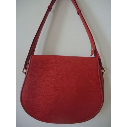MUST DE CARTIER.
Sac besace en cuir gainé...