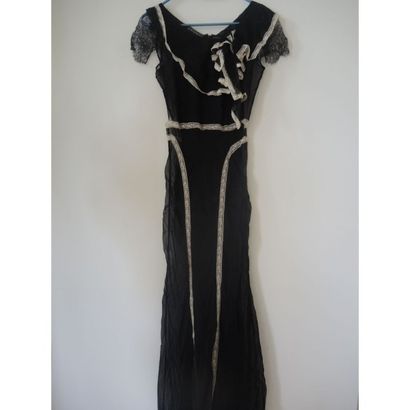 Lolita LEMPICKA. 
Robe longue en soie noire...