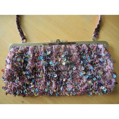 PIROVARI MILANO. 
Sac baguette en tissu rose...