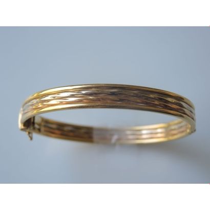 BRACELET rigide 3 ors ouvrant. Ø 6cm. Poids...