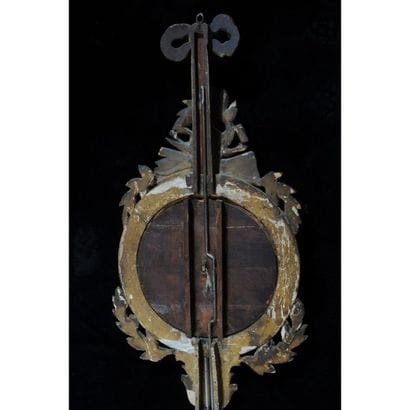BAROMETRE LOUIS XVI en bois doré à décor...