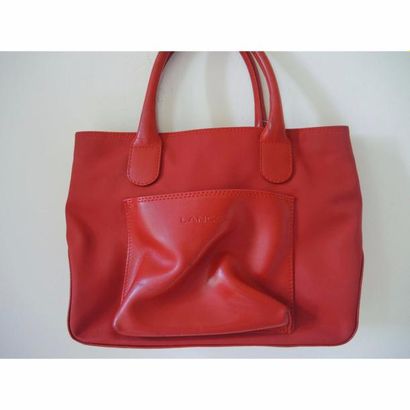 LANCEL. Sac en toile et cuir rouge. 2 anses...