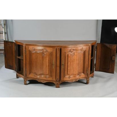 BUFFET DE BOISERIE de forme galbée et violonée...