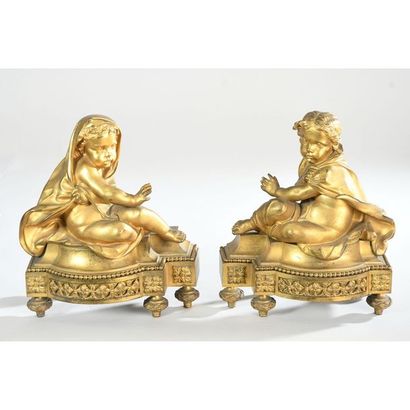 PAIRE DE CHENETS LOUIS XVI en bronze doré...