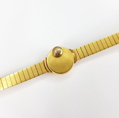 OMEGA - Ladies' round-arm watch in yellow...