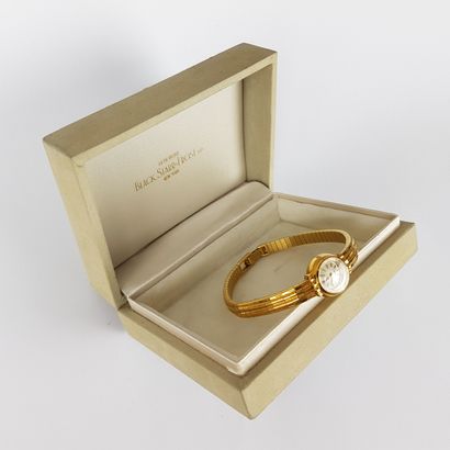 OMEGA - Ladies' round-arm watch in yellow...