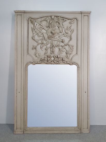 A Louis XVI style trumeau in grey wood with...