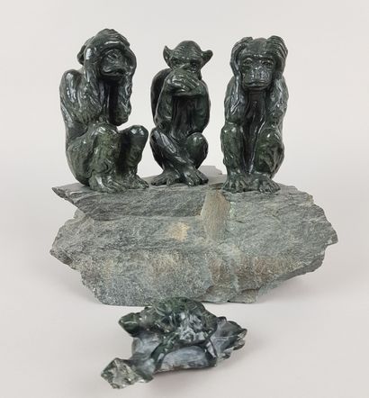 TWO carved stone SUBJECTS, one representing...