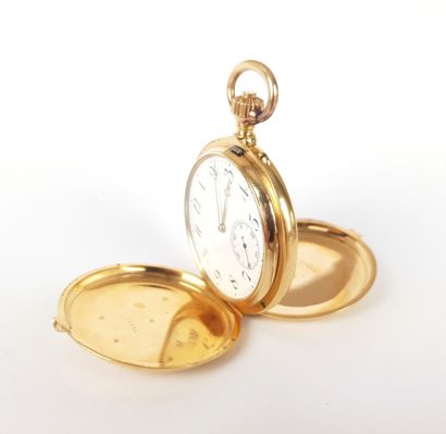 MONTRE savonnette en or jaune 750 ‰, à remontoir...