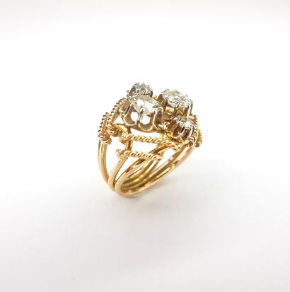 BAGUE en or rose et en or gris 750 ‰ ornée...