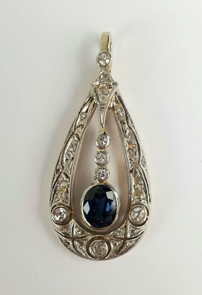 A 585 ‰ yellow gold and white gold piriform...