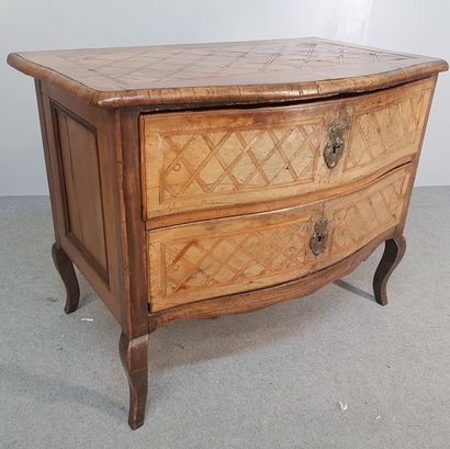 A Louis XV style COMMODE with a curved front...
