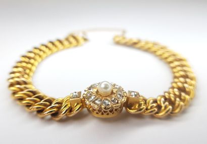 BRACELET in yellow gold 750 ‰ with American...