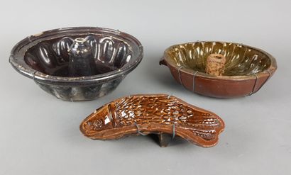 THREE old glazed terracotta cake moulds,...