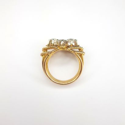 BAGUE en or rose et en or gris 750 ‰ ornée...