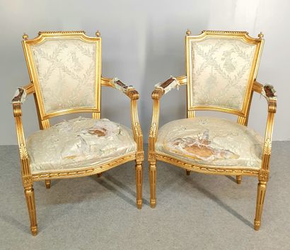 Pair of Louis XVI style armchairs in gilded...
