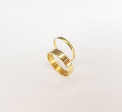 Two 750 ‰ yellow gold ALLIANCES one in a...
