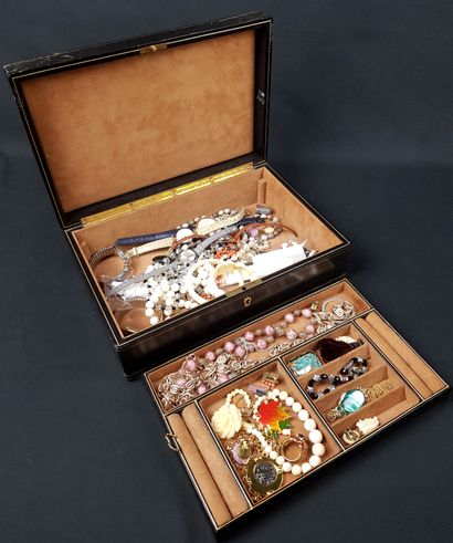 LOT of costume jewelry and watches in a jewelry...