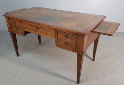 A Louis XVI style mahogany and mahogany veneer...