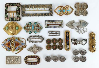 LOT comprising 18 belt buckles, two of which...