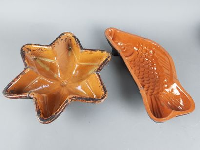 TWO antique brown glazed terracotta cake...