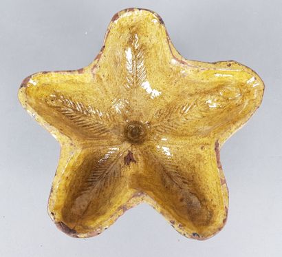 Antique yellow glazed earthenware cake mould...