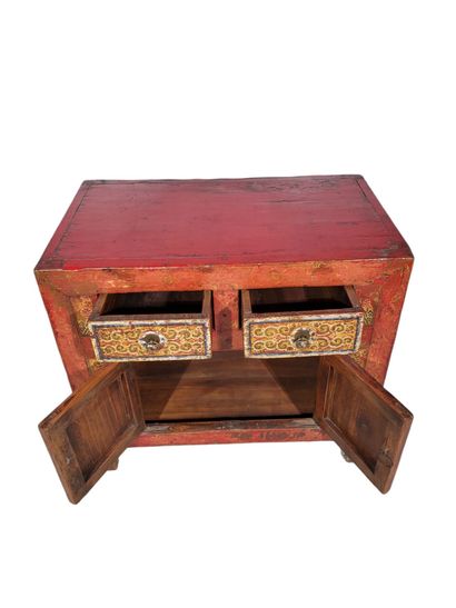 TIBET, 19th century
Red lacquered wood cabinet,...