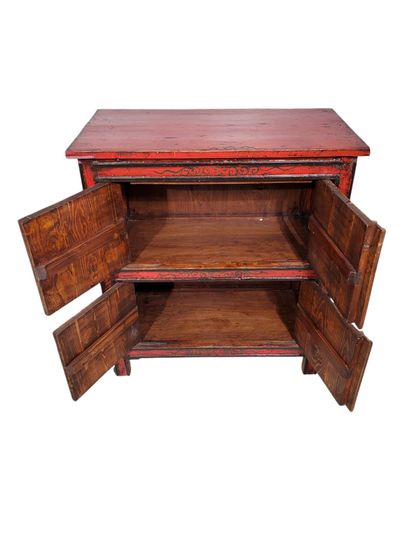 TIBET, 19th century
Red lacquered wood cabinet,...