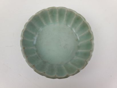 CHINA, Ming period
Three celadon-glazed ceramic...
