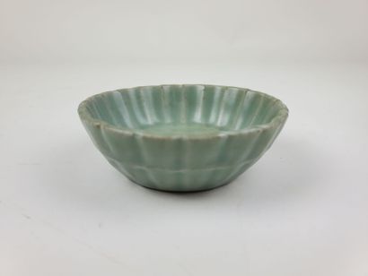 CHINA, Ming period
Three celadon-glazed ceramic...