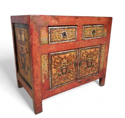 TIBET, 19th century
Red lacquered wood cabinet,...