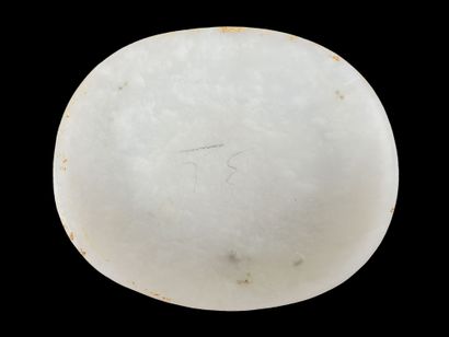 CHINA, 19th century
White jade scepter plate,...