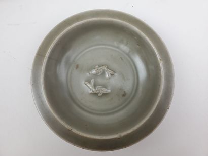 CHINA, Ming period
Three celadon-glazed ceramic...