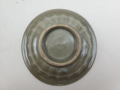 CHINA, Ming period
Three celadon-glazed ceramic...