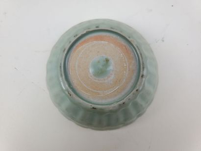 CHINA, Ming period
Three celadon-glazed ceramic...