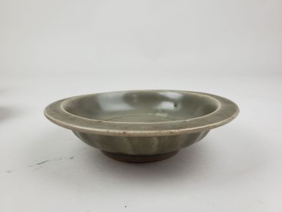 CHINA, Ming period
Three celadon-glazed ceramic...