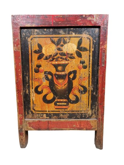 TIBET, 19th century
Red lacquered wood cabinet,...