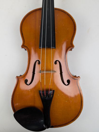 A 1/4 VIOLIN with bow, in case
Chinese manufacture
Violin...