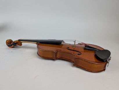 A 1/4 VIOLIN with bow, in case
Chinese manufacture
Violin...