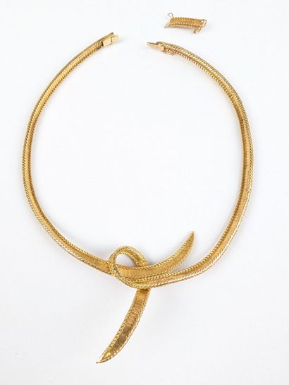 Collier en or jaune 750 ‰ maille semi-rigide...