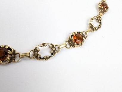 Collier en or jaune 585 ‰ à motifs émaillés...