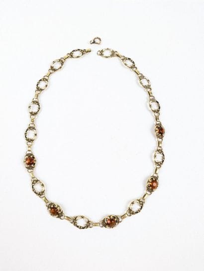 Collier en or jaune 585 ‰ à motifs émaillés...