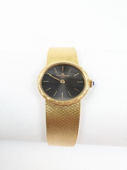 BAUME & MERCIER
Montre bracelet dame en or...