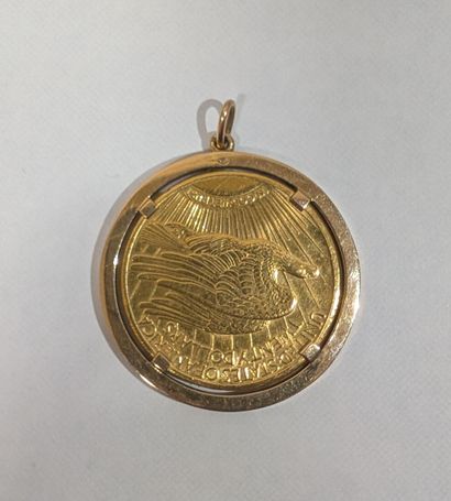 Pendentif en or 750 ‰ orné d'une pièce de...