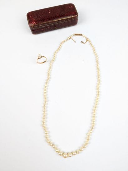 Parure en or rose 750 ‰ et perles de culture...