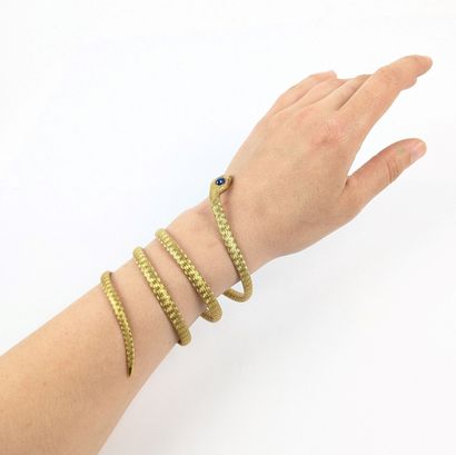 Important bracelet en or jaune 750 ‰ figurant...