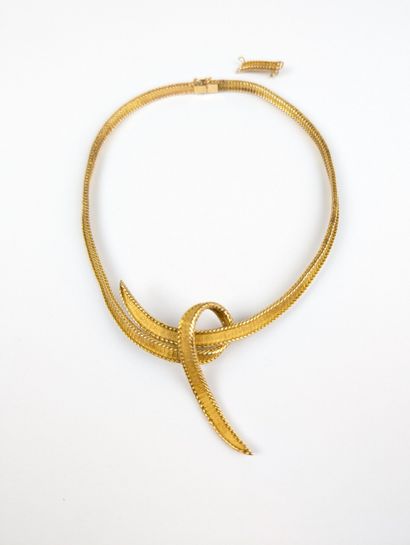 Collier en or jaune 750 ‰ maille semi-rigide...