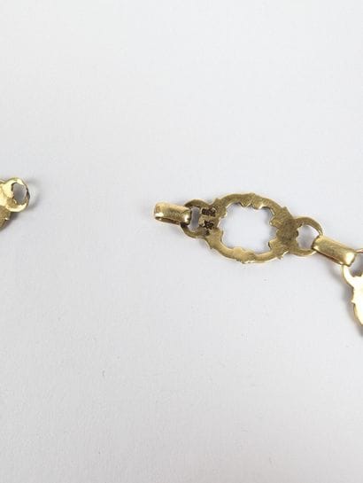 Collier en or jaune 585 ‰ à motifs émaillés...